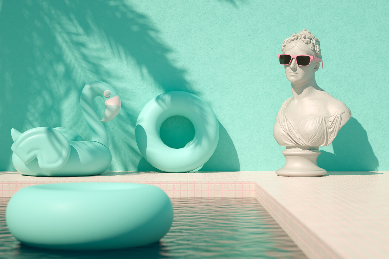 Bust sculpture with sunglasses at swimming pool summer holiday travel background palm tree shadow